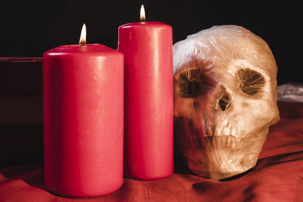 red candles skull plastic bag